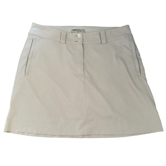 Nike Pants - Nike Beige Golf Skort ~ 2 button zipped closure ~ side and back pockets ~ size M